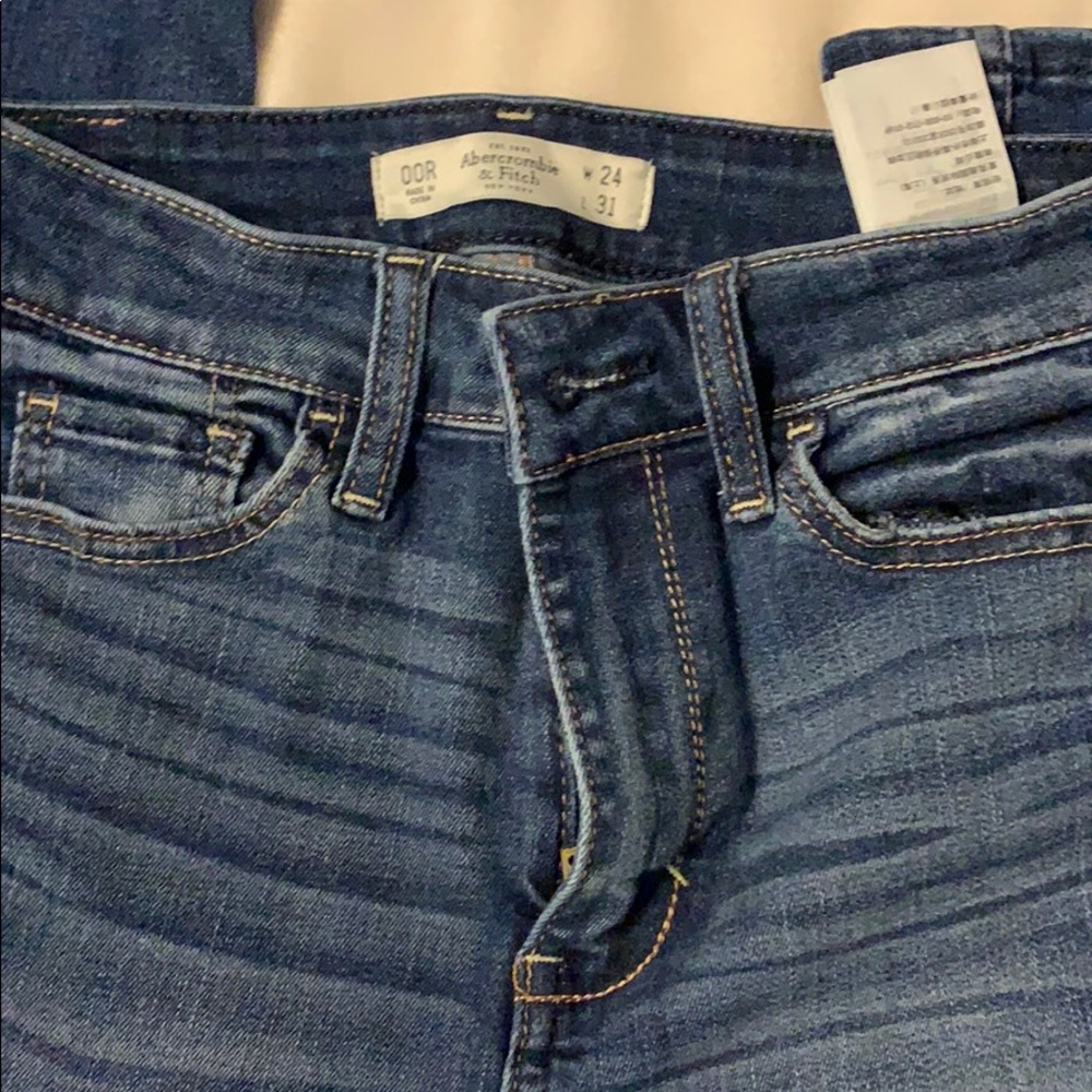 Medium wash high waisted skinny jeans